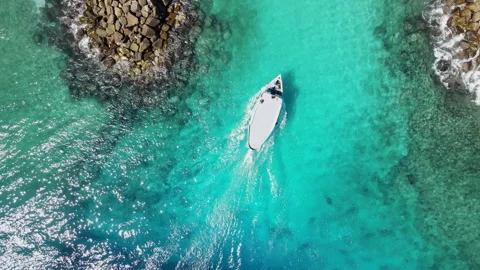 Aerial view of diving boat speeding to the port at Fuvahmulah, Maldives Stock-Footage 243922232