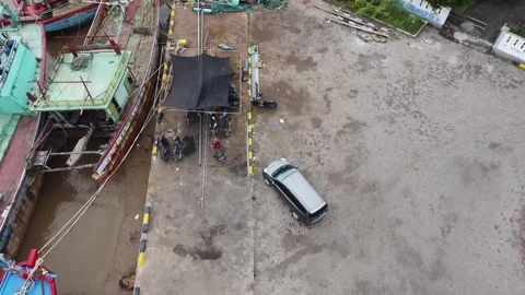 Aerial View of Dock with Parked SUV and Motorcycles Stock-Footage 280172110