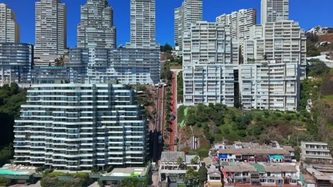Aerial view dolly in of a private funicular in a modern residential condominium Stockbeeldmateriaal 335976729