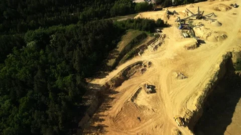 Aerial View of Dolomite Open-Pit Mine with Conveyor Belts and Forest Surrounding Stock Footage 277357979