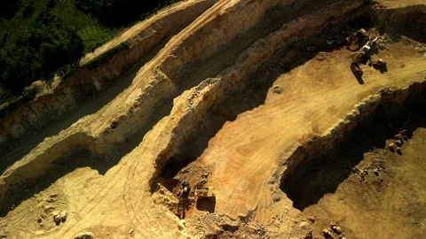 Aerial View of Dolomite Quarry with Active Machinery An aerial view of a dolomit Stock Footage 277359134
