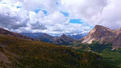 Aerial view of the Dolomites through the clouds Stock Footage 220598803