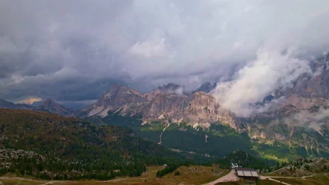 Aerial view of the Dolomites through the clouds Stock Footage 220600662