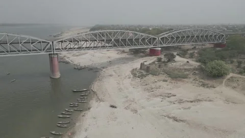 Aerial view of double decker bridge over the Ganges at Varanasi. 動画素材 340134813