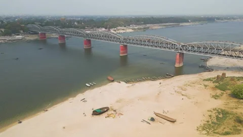 Aerial view of double decker bridge over the Ganges at Varanasi. Видео 340134979