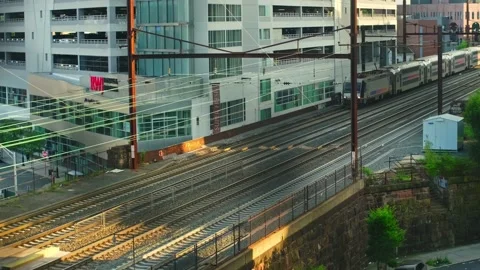 Aerial view of a double decker NJ Transit train arriving New Brunswick Train Stock Footage 201157024