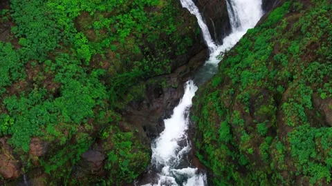 Aerial View of a Double Waterfall Cascading Through the Lush Green Mountains Stock-Footage 342701897