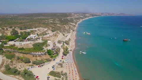 Aerial view down length of Paradise Beach, Kos, Greece Stock Footage 162948902