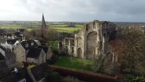 Aerial view, down move. Surroundings of an old abbey in Malmsbury, England Stockbeeldmateriaal 138208764