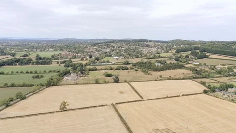 Aerial view, down move until ground. In background, Kelsall small village amo Stock Footage 95560468