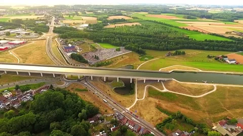 Aerial view down towards Pont du sart aqueduct in Belgium with cars passing u 動画素材 154801281