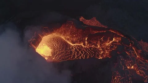 Aerial view down into volcano Stock Footage 238845479