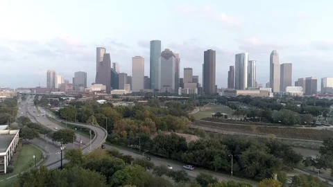 Aerial view of downtown Houston skyline and the Houston bayou Stock Footage