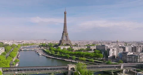 Aerial view of downtown Paris. A drone flies over the Seine River towards the Stock Footage 221405897