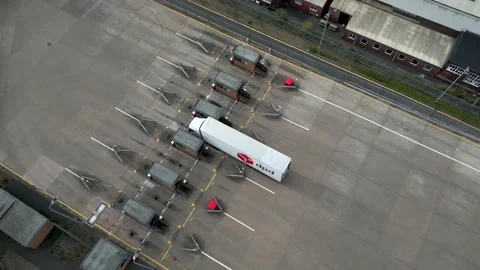 Aerial view of a DPD parcel delivery truck at a security checkpoint Stockbeeldmateriaal 229409931