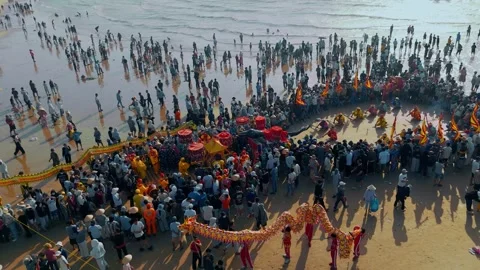 Aerial view: Dragon dance surrounding Nghinh Ong parade on Phuoc Hai beach Stock Footage 334452229