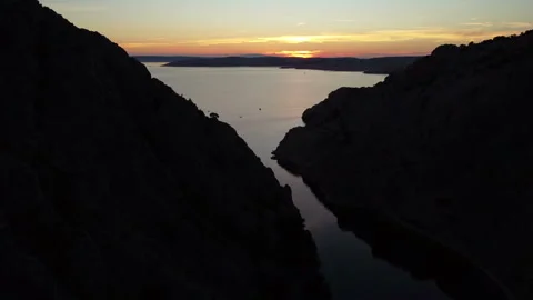Aerial view of a dramatic canyon and cliffs taken in Croatia. Zavratnica Bay Stock Footage 317897219