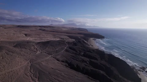 Aerial view of dramatic cliffs near La Pared, Fuerteventura Stock Footage 310407614