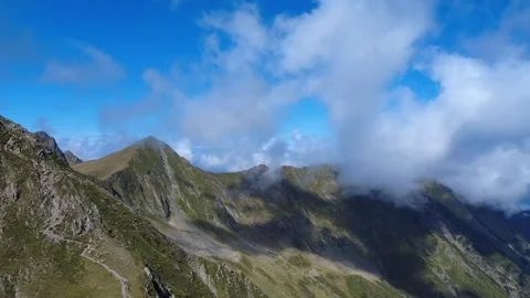 Aerial view of dramatic clouds rolling over Carpathian mountain peaks. Stock Footage 344040999