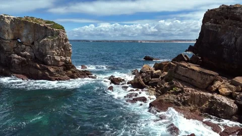 Aerial View of Dramatic Coastal Rock Formations Along Portugal's Shoreline Vídeos de archivo 345841119