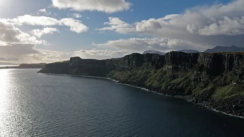 Aerial view of the dramatic coastline at the cliffs by Staffin close to the Stock Footage 99050441