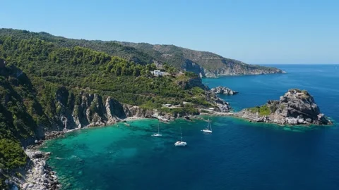 Aerial view of the dramatic coastline of Skopelos Island, Greece, with the Stock Footage 346701094