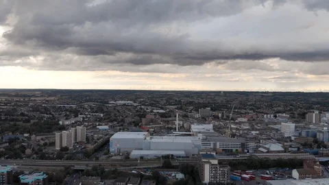 Aerial view of dramatic dark thunder storm clouds rolling over Romford Stock Footage 93691687