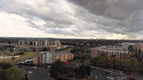 Aerial view of dramatic dark thunder storm clouds rolling over Queens Stock Footage 93691694
