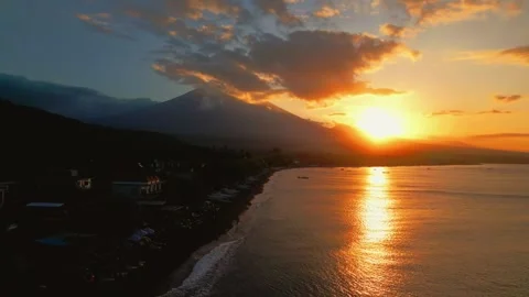 Aerial View of Dramatic Golden Sunset over Bali Coastline, Indonesia Stock Footage 340841610