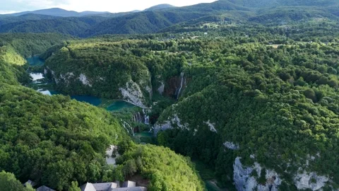 Aerial view of dramatic gorge with river and waterfalls in nature Stock Footage 323503885