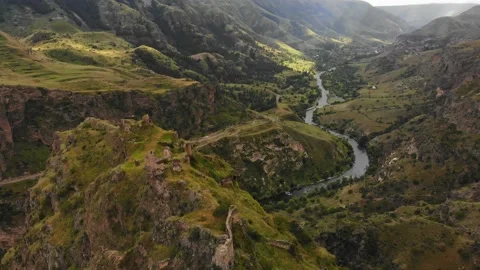 Aerial view dramatic landscape with historical Tmogvi fortress ruins with old Stock-Footage 201417387