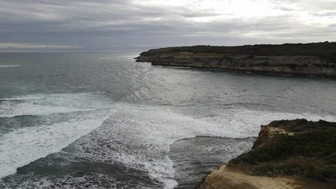Aerial view of dramatic limestone cliffs and ocean Stock Footage 336001599