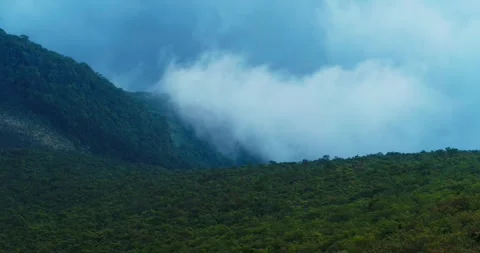 Aerial View of Dramatic Mountain Landscape with Sunset Sky and Fog Indonesia Stock Footage 331708663