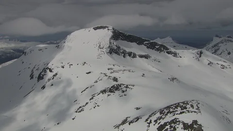Aerial view of with dramatic mountain peaks and open sea. Stock Footage 87730044