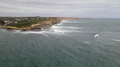 Aerial view of dramatic ocean coastline and cliffs Video stock 336001719