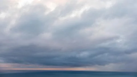 Aerial view of dramatic rain clouds over Tasman sea horizon Stock Photos