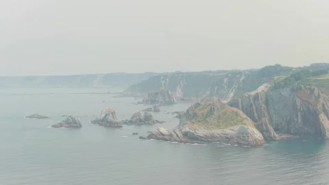 Aerial view of the dramatic rocky coastline near Cudillero, Asturias, Spain Stock Footage 346706762