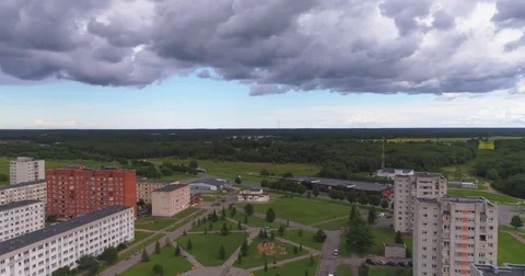Aerial view of dramatic storm clouds over city, heavy rainfall is coming. Stock Footage