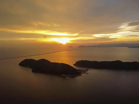 Aerial view dramatic sunset cloud over Pulau Aman Island Stock Photos