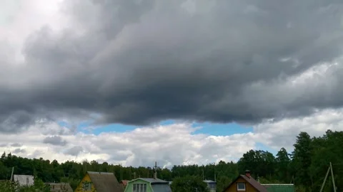 Aerial view of a dramatic timelapse showing heavy storm clouds Stock Footage 317088714