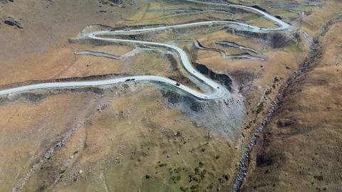 Aerial View of the Dramatic Too-Ashuu Pass Hairpin Turns, Kyrgyzstan Stock Footage 340922001
