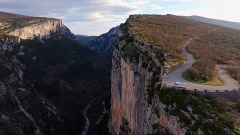 Aerial view of dramatic Verdon Gorge and road trip stop at sunrise Stock Footage 310690533