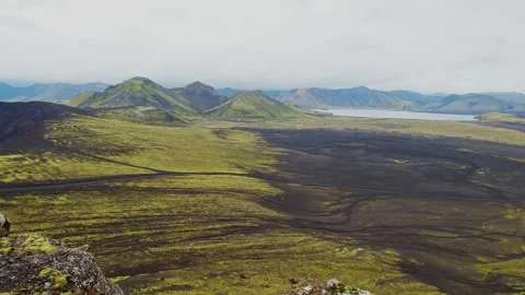 Aerial view of the dramatic volcanic landscape of the Icelandic Highlands with g Stock Footage 320512857