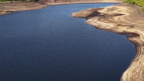 Aerial view of a dramatically low Woodhead Reservoir during drought conditions, Stock-Footage 311591319