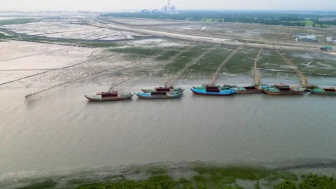 Aerial view of drazer machine and troller boat in the river  Stock Footage 273629828