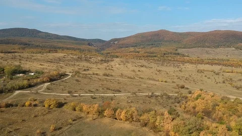 Aerial view of a drear field Stock Footage 99007372