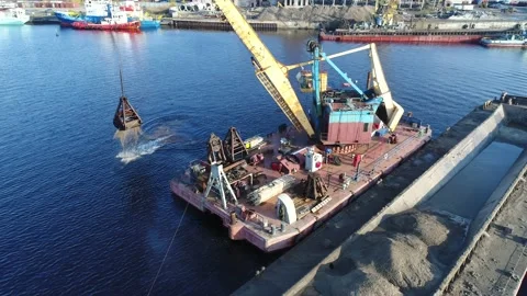 Aerial view. Dredger is working. Extraction of river sand by special float crane Stock Footage 231072309