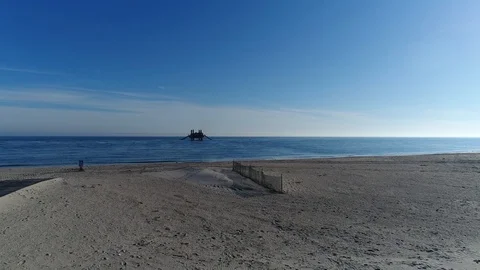 Aerial view of dredging pump in Atlantic Ocean Overlook Beach Video stock 102846950