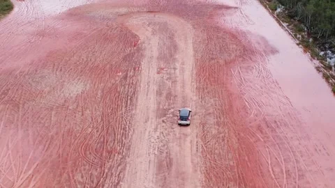 Aerial view of a driver learning to drive in an empty lot Stock-Footage 325641188