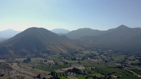 Aerial view dron fields town mountain day Stock Footage 105507931